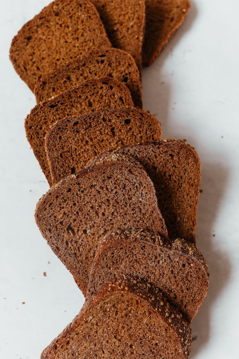 slices of brown bread on a white surface